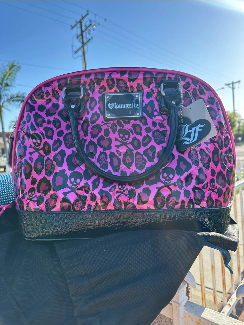 Loungefly Black and Hot Pink Leopard Skull Satchel